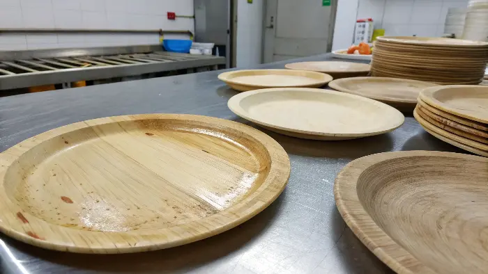 A family using the same set of bamboo plates for breakfast and dinner